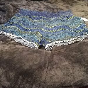 Colorful blue, turquoise, and mustard shorts